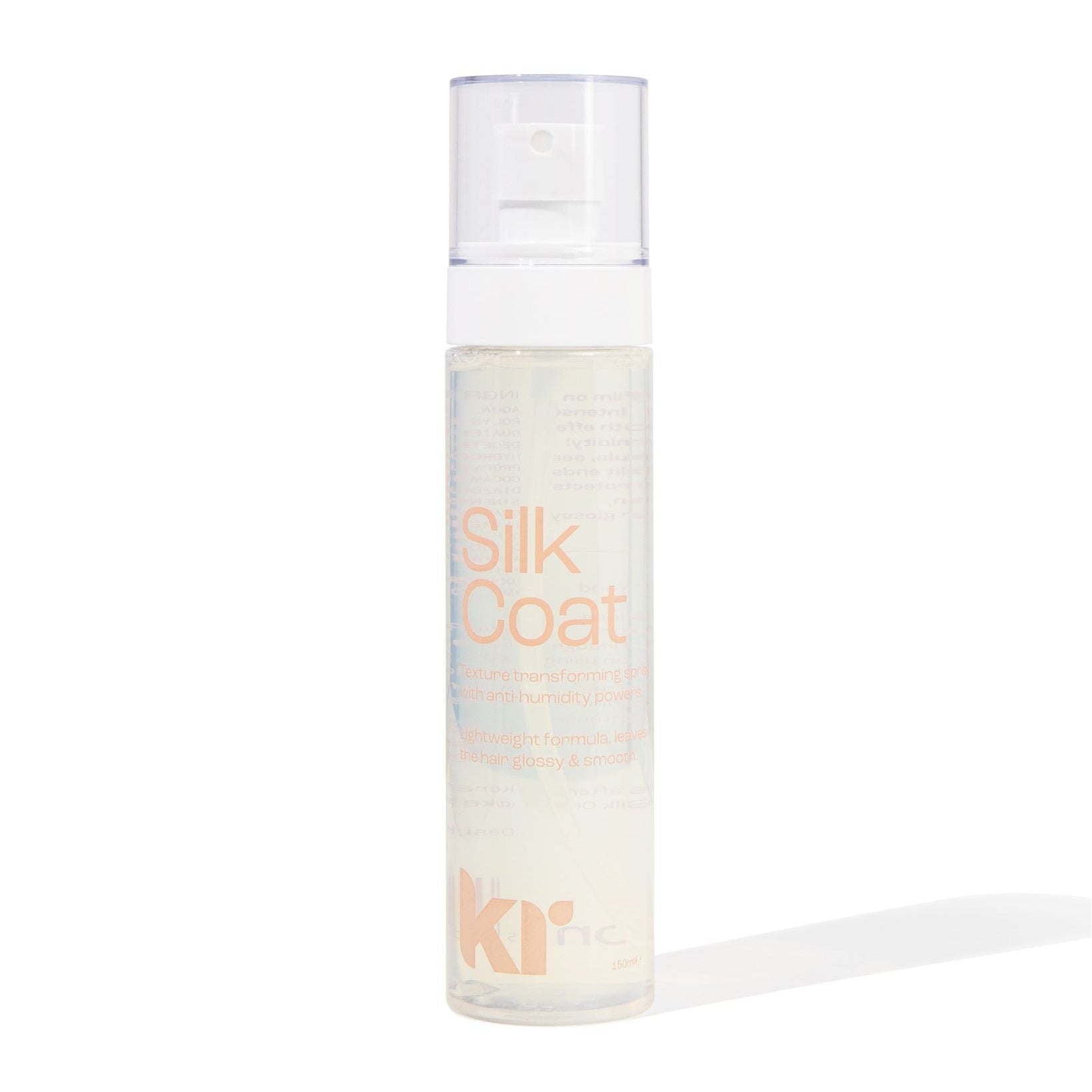 Bottle of Silk Coat hair product on a white background