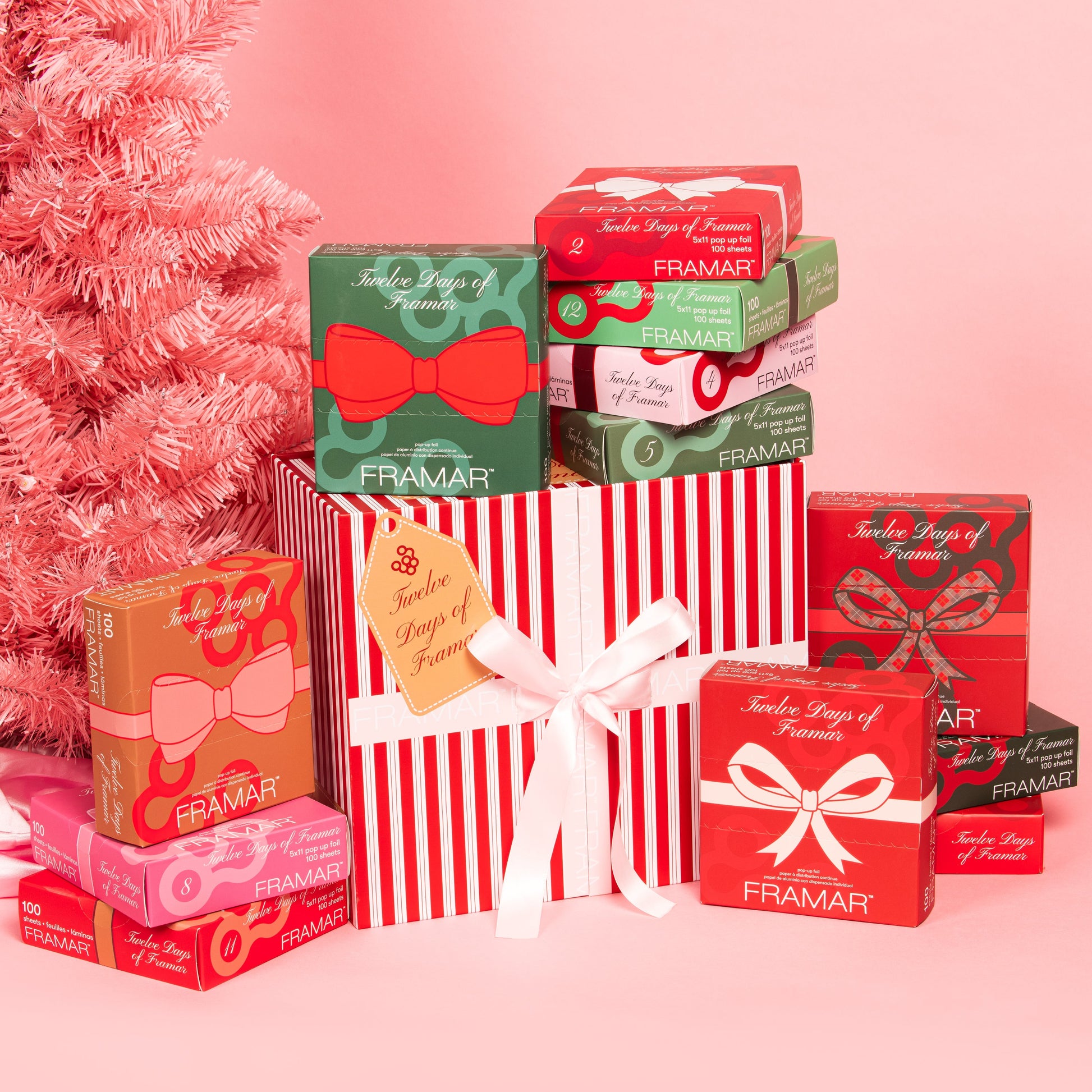 Collection of Framar boxes with a pink Christmas tree in the background